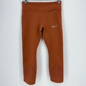 Nike Rust Orange Cropped Leggings with Reflective Swoosh